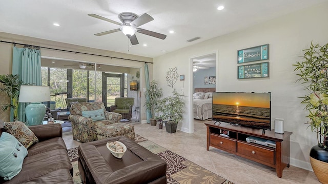 tiled living room with ceiling fan