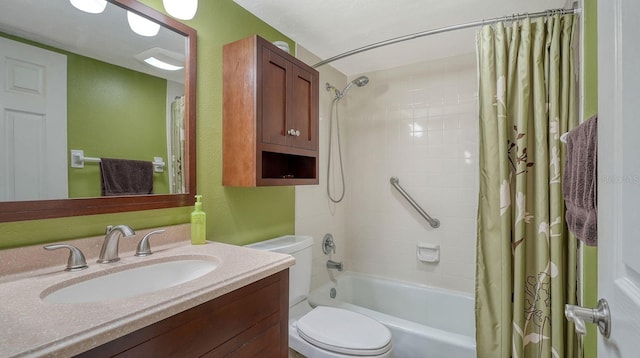 full bathroom with toilet, vanity, and shower / tub combo with curtain