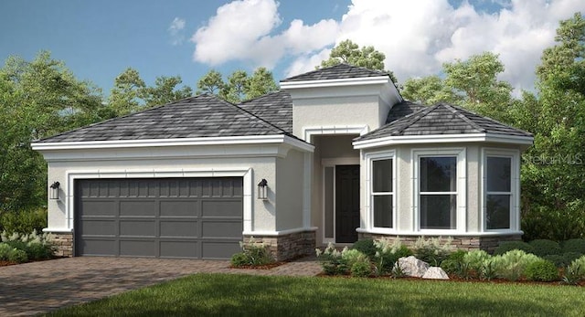 view of front of house featuring a garage, stone siding, stucco siding, and decorative driveway