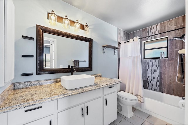 full bathroom featuring shower / tub combo, vanity, tile patterned flooring, and toilet