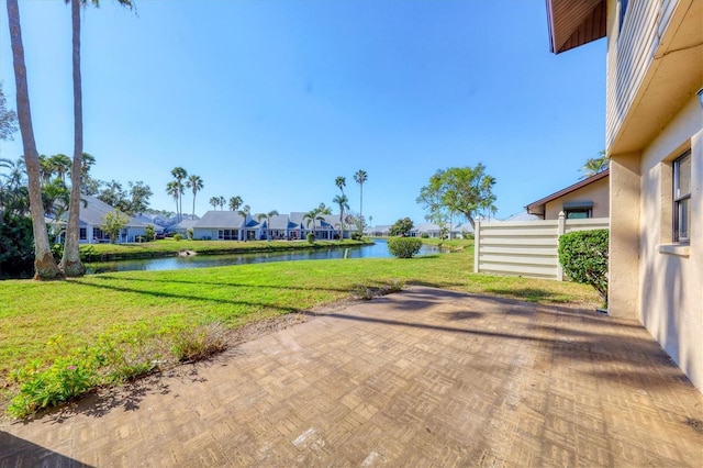 exterior space with a water view