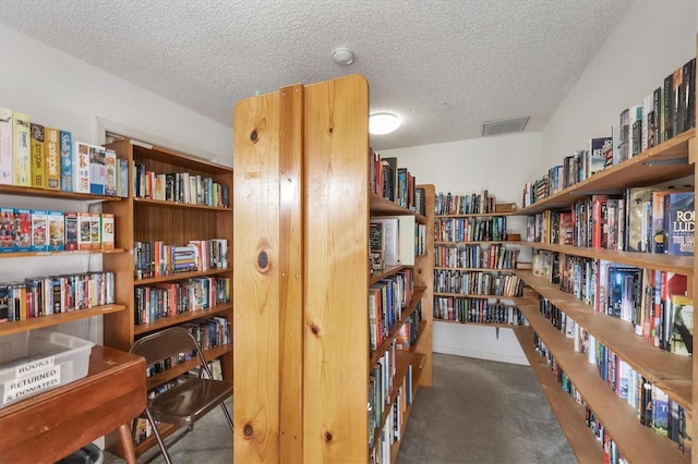 sitting room with a textured ceiling