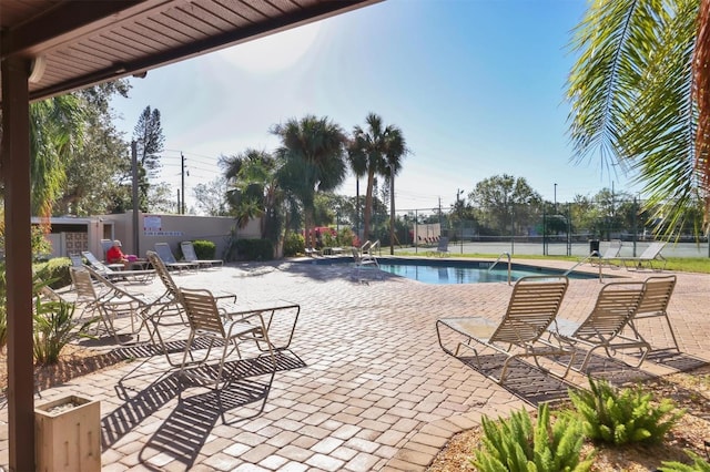 view of swimming pool with a patio area