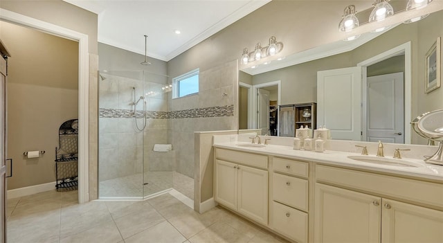 full bath featuring double vanity, crown molding, walk in shower, and a sink