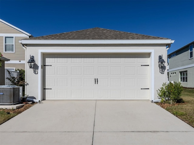 garage featuring central AC unit