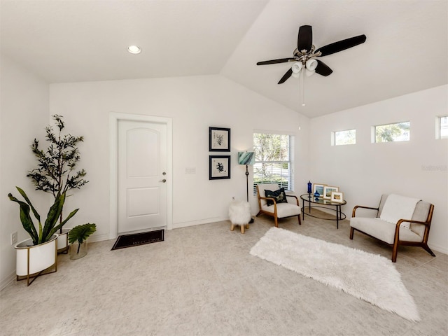 sitting room featuring ceiling fan and vaulted ceiling