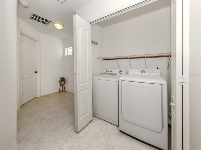 laundry area featuring washer and dryer