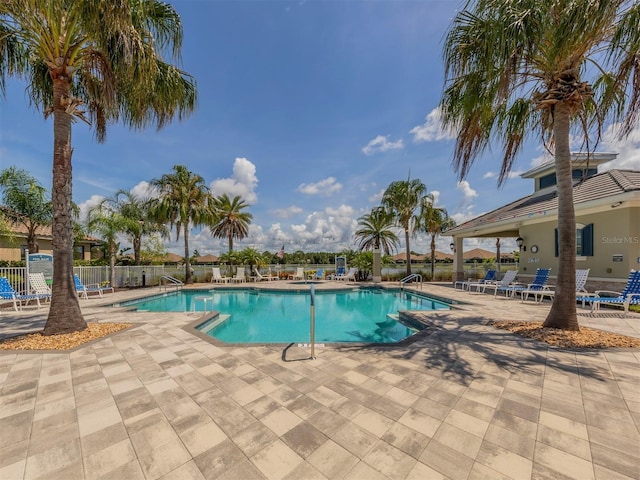 view of swimming pool featuring a patio