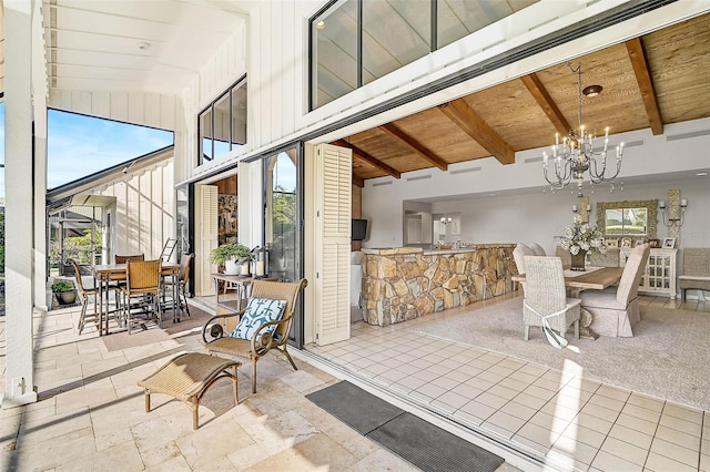 view of patio with outdoor dining space and an outdoor kitchen