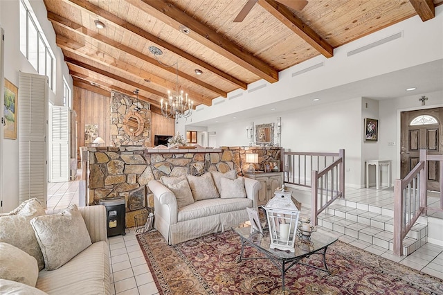 tiled living area featuring wooden ceiling, visible vents, beamed ceiling, and a towering ceiling