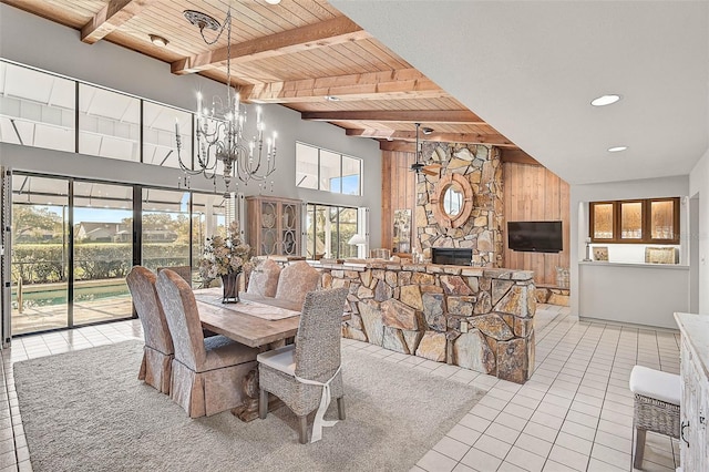 dining space featuring wooden ceiling, light tile patterned flooring, a notable chandelier, and beamed ceiling