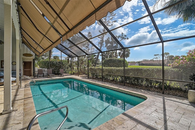 view of pool with a fenced in pool, a lanai, and a patio