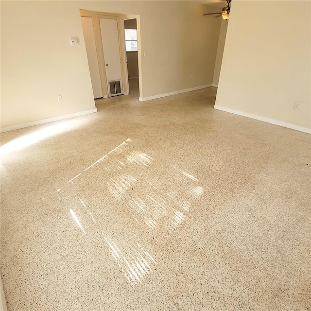 empty room with ceiling fan