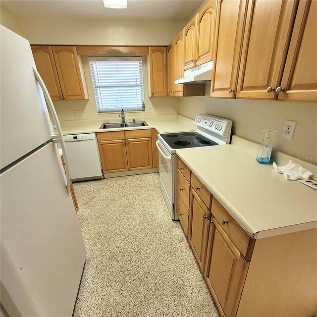 kitchen with sink and white appliances