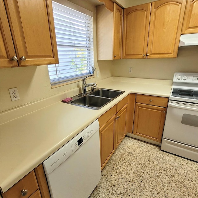 kitchen featuring white appliances and sink