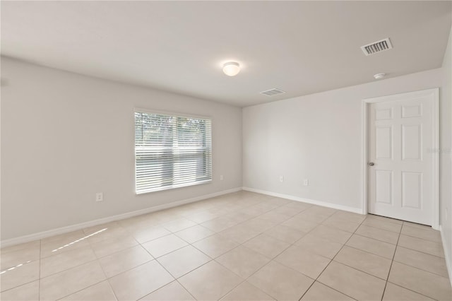 view of tiled spare room