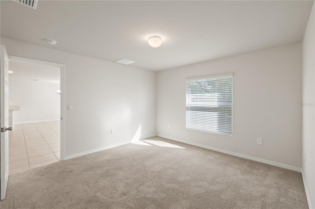 view of carpeted spare room