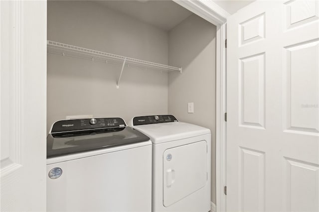 laundry area with washer and dryer