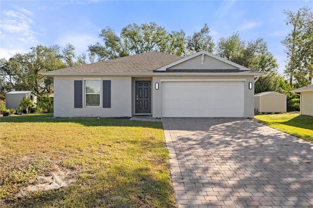 ranch-style home with a front yard and a garage