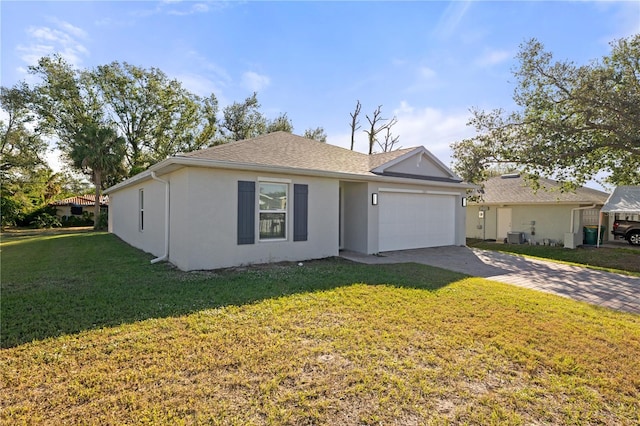 single story home featuring a front yard and a garage