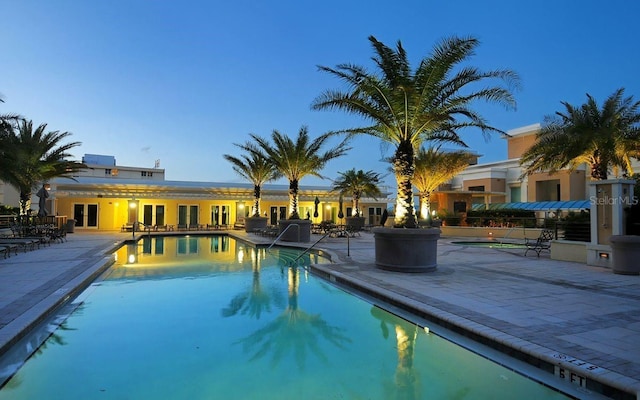 pool featuring french doors and a patio