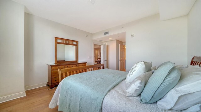 bedroom featuring light hardwood / wood-style floors