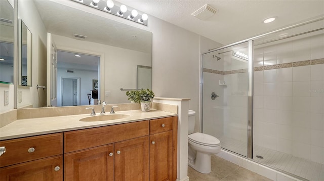 full bathroom featuring visible vents, a shower stall, and toilet