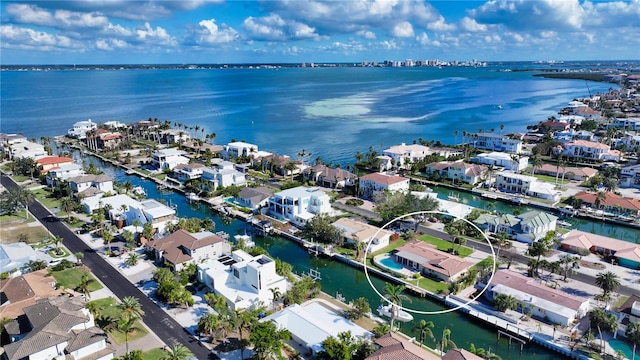 bird's eye view with a water view