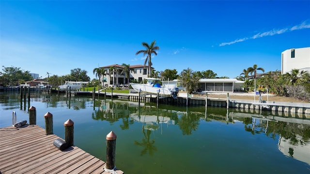 dock area featuring a water view