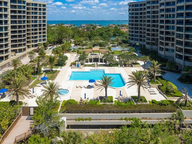 view of pool featuring a water view