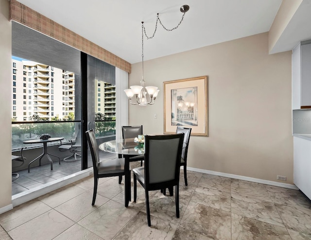 dining room featuring a chandelier