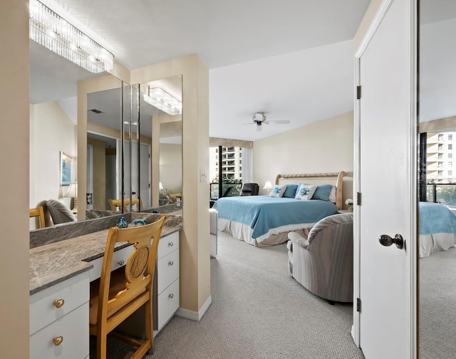 carpeted bedroom featuring multiple windows and ceiling fan