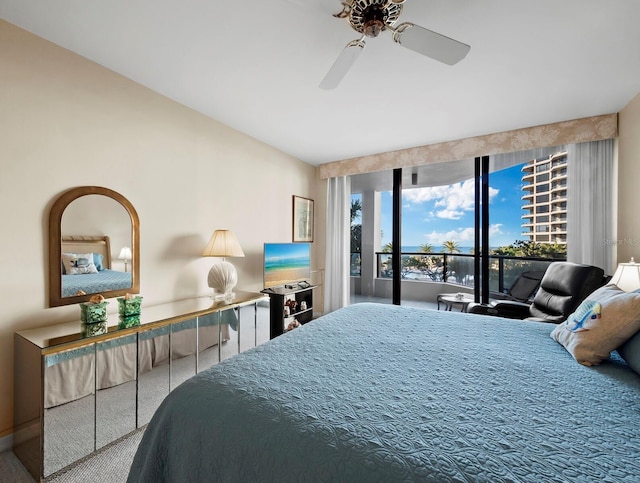 carpeted bedroom with access to outside and ceiling fan