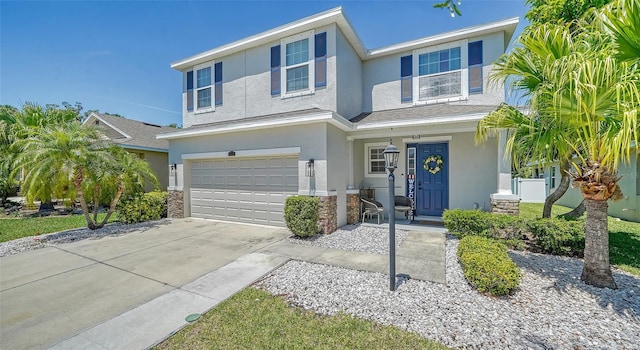 view of front of property with a garage