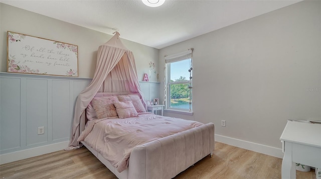 bedroom featuring light hardwood / wood-style floors