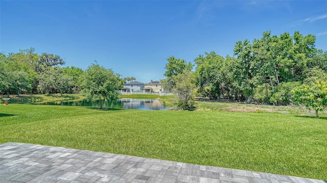 view of yard with a water view