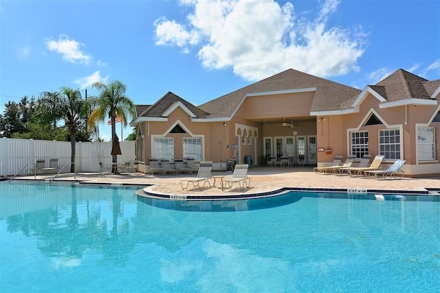 view of pool featuring ceiling fan and a patio