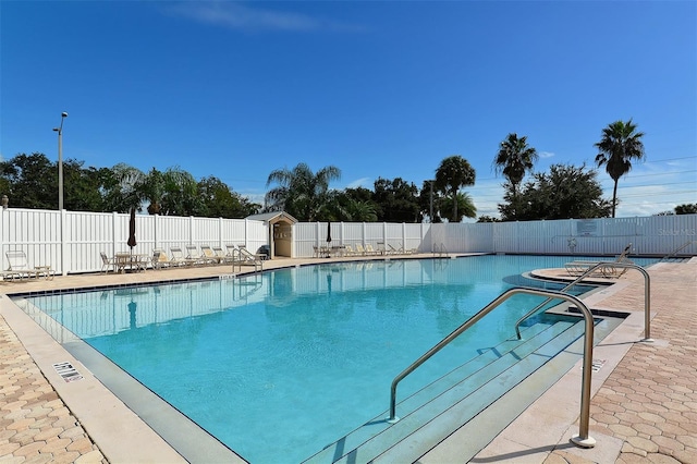 view of swimming pool featuring a patio