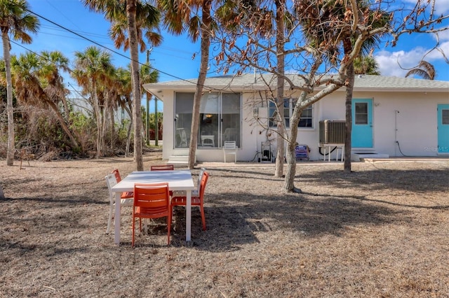 back of property featuring a patio