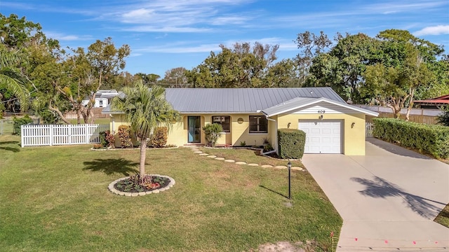 ranch-style house featuring a front yard and a garage