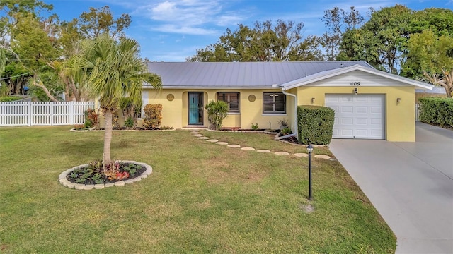 single story home featuring a garage and a front lawn