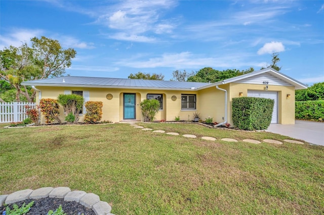 ranch-style house with a garage and a front lawn