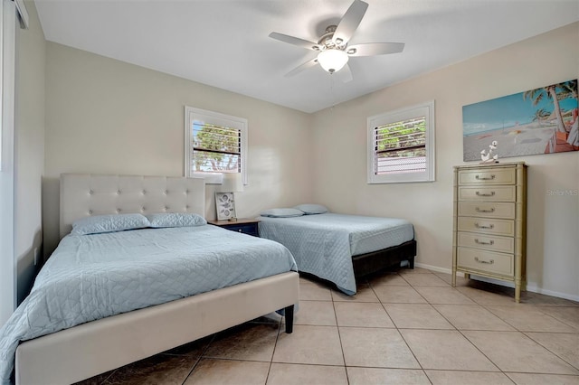 bedroom featuring ceiling fan and light tile patterned floors