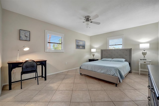 bedroom featuring ceiling fan and light tile patterned floors