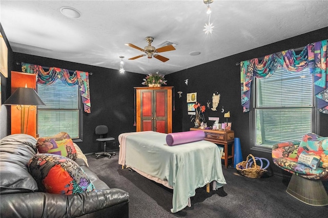 carpeted bedroom with ceiling fan