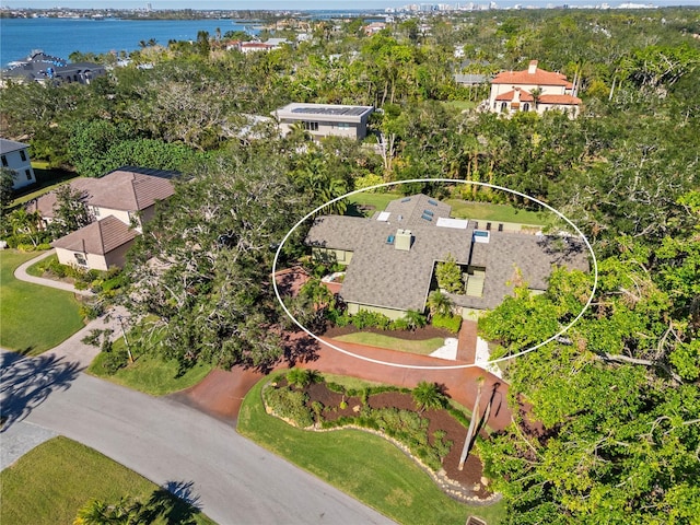 birds eye view of property featuring a water view