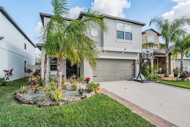 view of front of house featuring a front yard and a garage