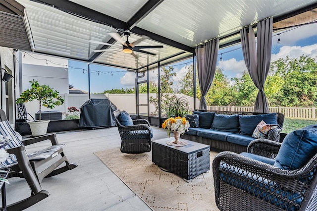 view of patio / terrace with an outdoor living space, ceiling fan, and a grill