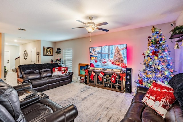 living room featuring ceiling fan