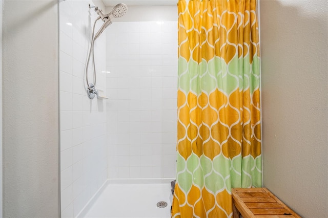 bathroom with curtained shower